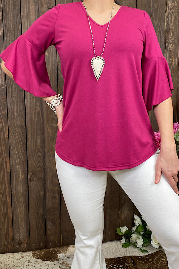 GJQ10294 Solid magenta v-neck blouse w 1/2 ruffle sleeves