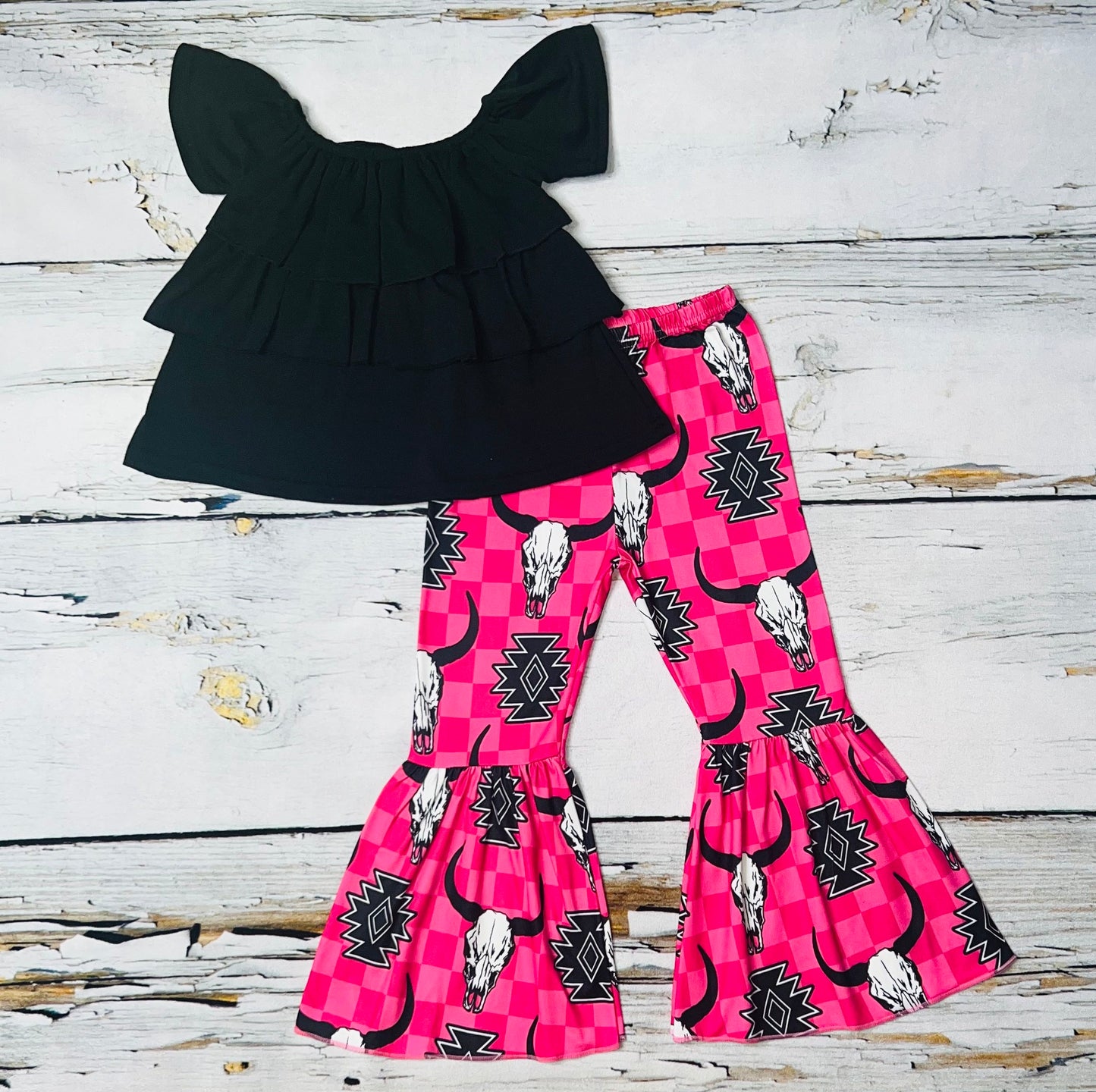 Black ruffle top w/hot pink checkers & bull skulls print bell bottoms 2pc set