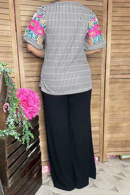 Women's blouse with very detailed embroidered balloon sleeves XCH16812