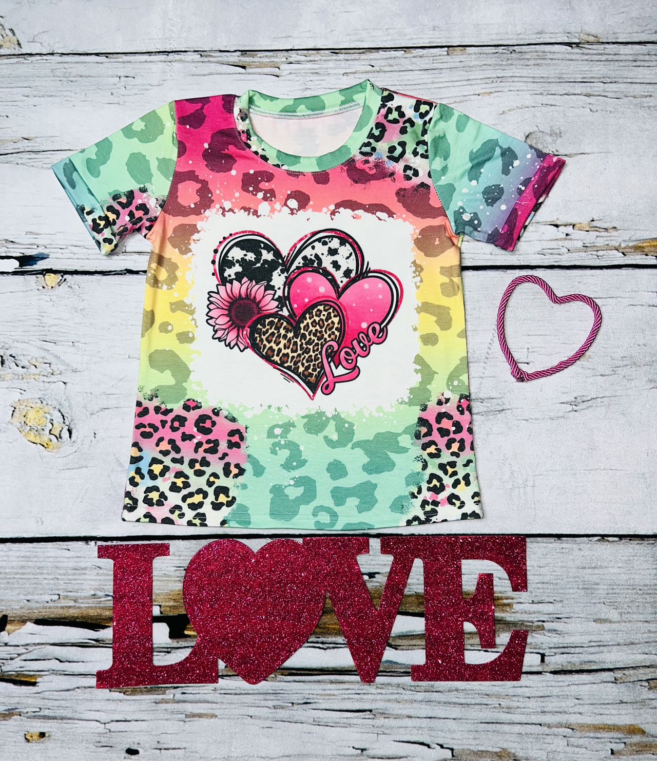 Multicolor animal print with hearts, sunflower, and love logo t-shirt DLH1212-2